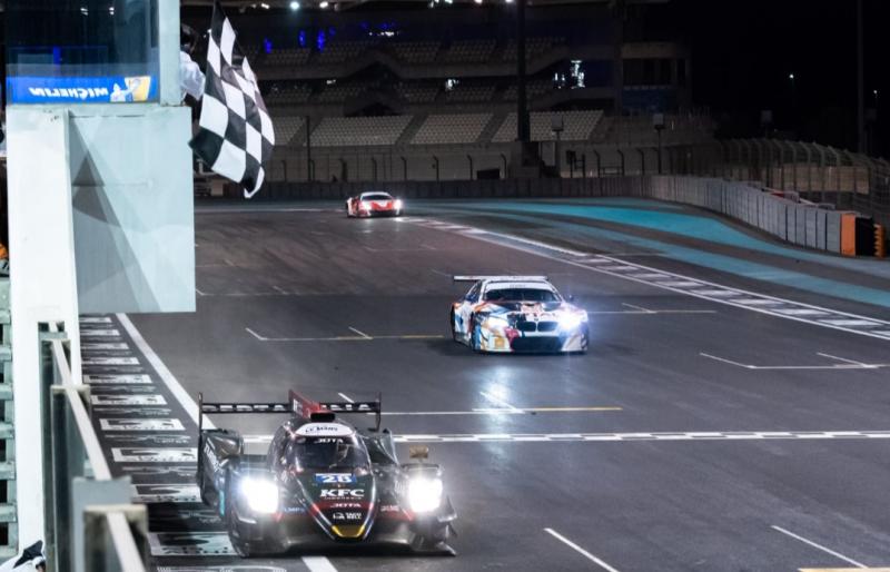 Sean Gelael menembus finish line pertama ajang Asian Le Mans Series di sirkuit Yas Marina, Abu Dhabi, UEA, Jumat malam