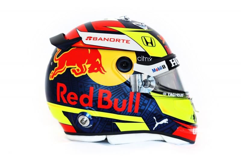 Helm perdana Sergio Perez di tim Red Bull, balik ke nuansa kuning favoritnya. (Foto: motorsportweek)