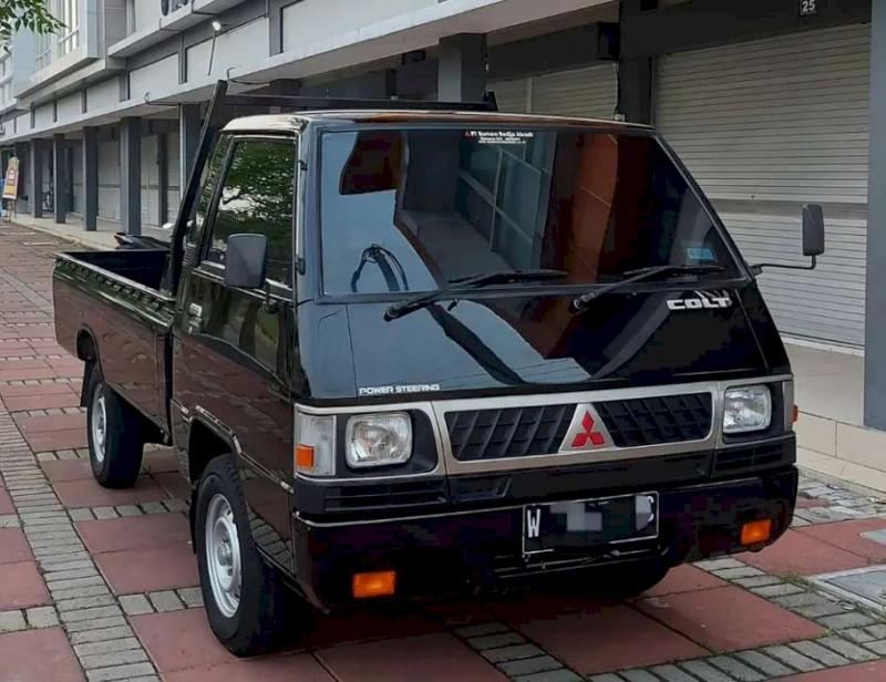 Pickup andalan Mitsubishi, L300 yang memiliki daya angkut mumpuni untuk angkutan barang