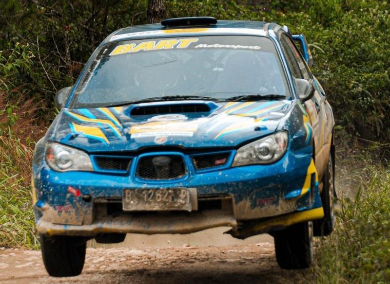 Aksi Bintang Barlean menggunakan Subaru WRX yang mampu menyodok di posisi terhormat pada Danau Toba Rally - APRC Grand Finale 2023 di Parapat, Kabupaten Simalungun, Sumatra Utara, 24-26/11/2023